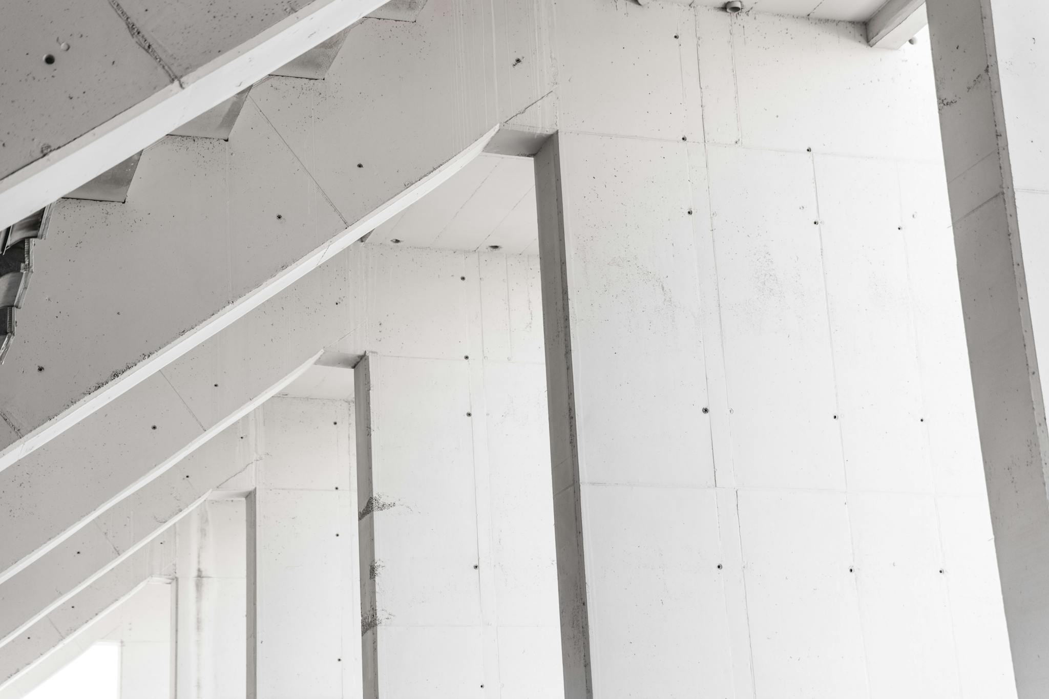 Abstract view of modern concrete pillars showcasing minimalist architectural design.